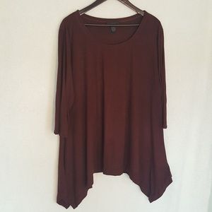 Tunic with shark bite hem